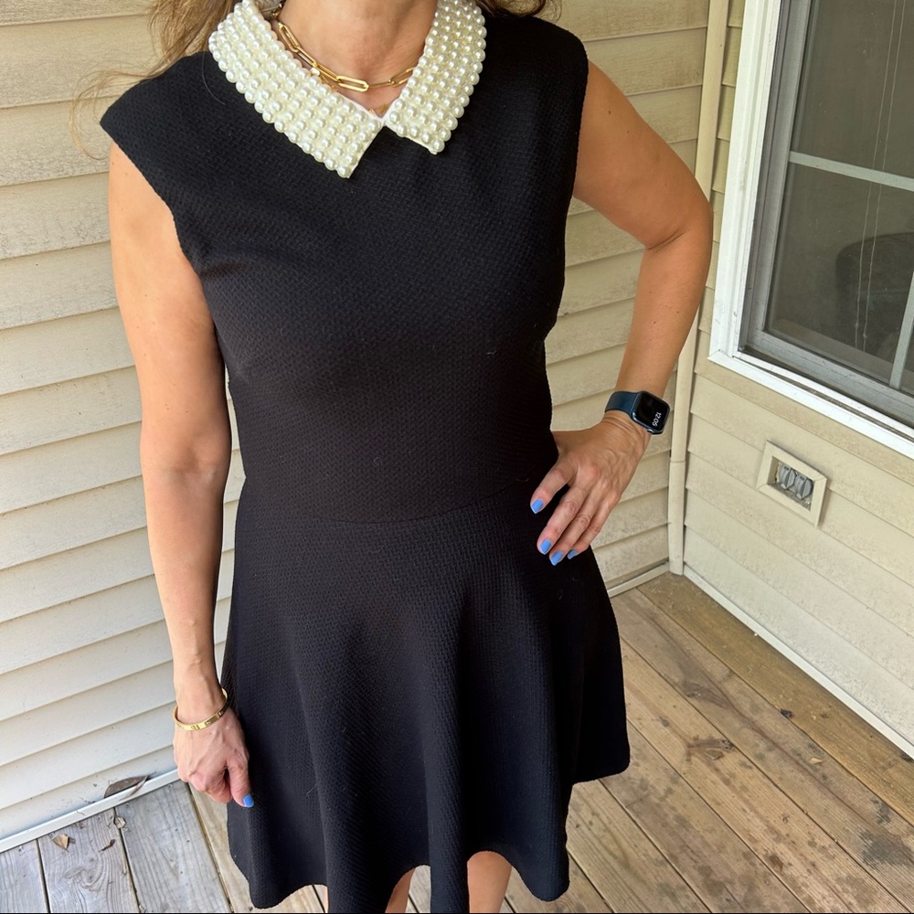 Black pearl-collared dress